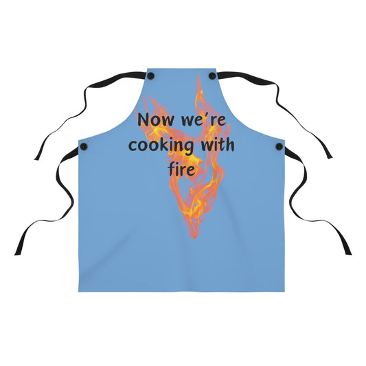 "Now We're Cooking With Fire" (black on light blue) Apron FD03blb